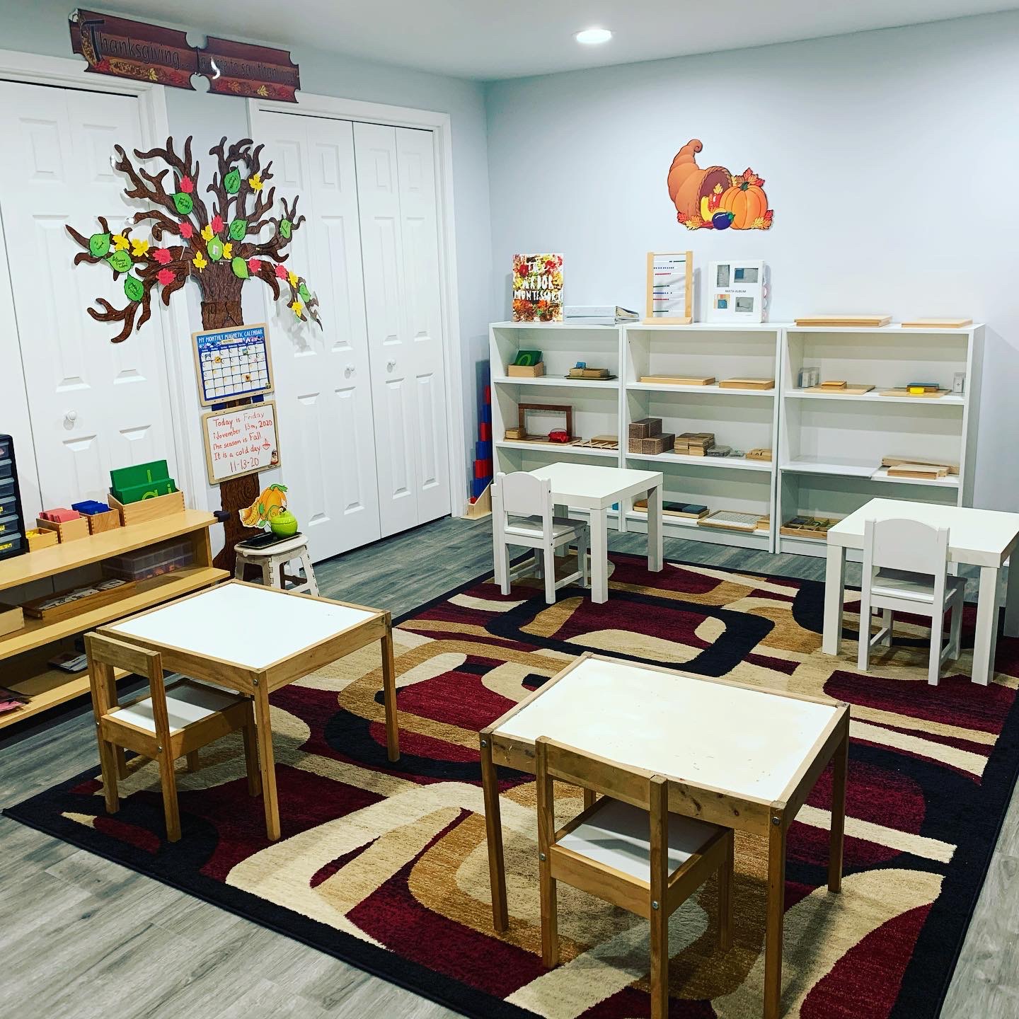 Wooden tables and materials shelves in the classroom